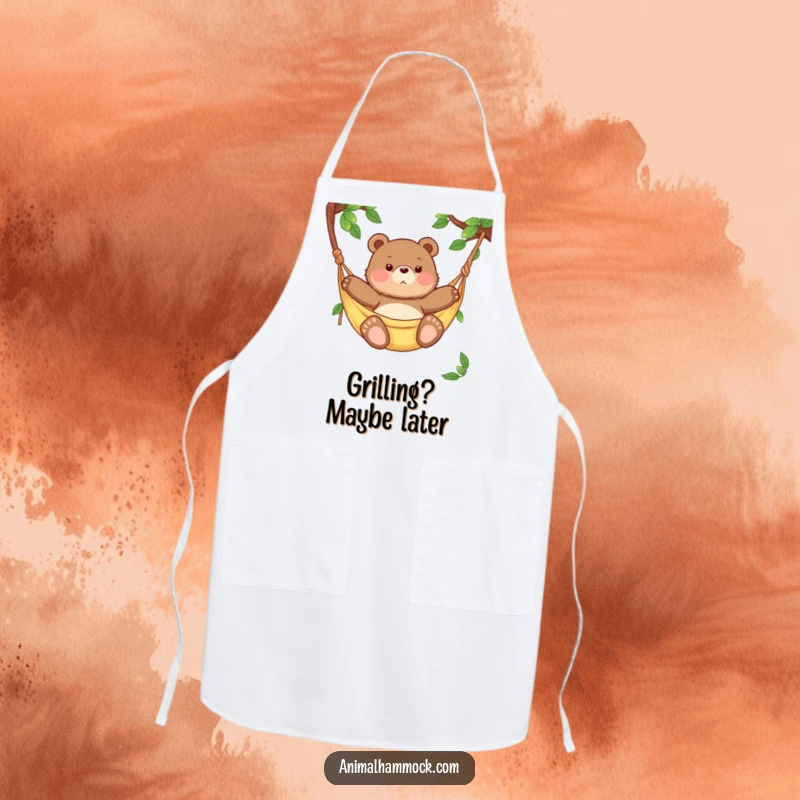 Funny chubby bear cub relaxing in a hammock, printed on an apron for humorous kitchen protection and chef appreciation.