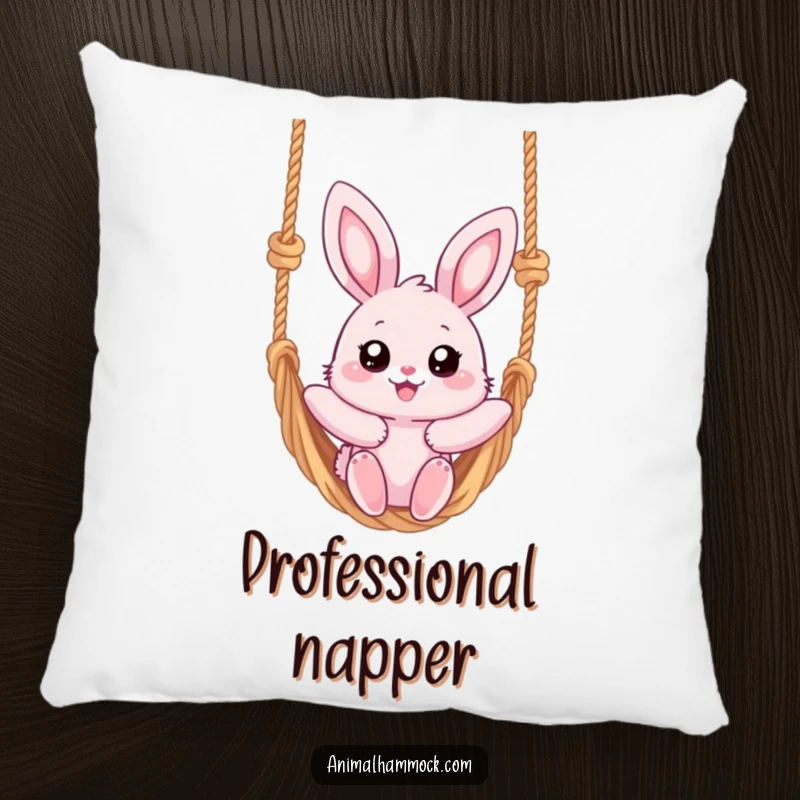 Funny pillow featuring a fluffy pink bunny with big eyes, joyfully swinging on a rope hammock, designed for comfort and peace.