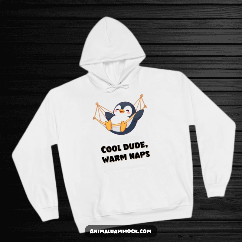 Funny Penguin Hoodie: A contented penguin gleefully sliding into a hammock, radiating comedic joy and arctic charm, an excellent funny gift.