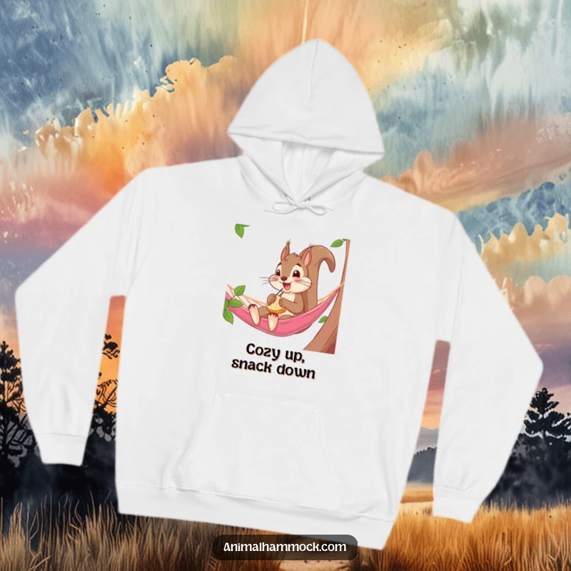 Funny Squirrel Hoodie: A playful squirrel munching on snacks while lounging in a hammock, radiating comedic joy and cozy comfort, an excellent funny gift.