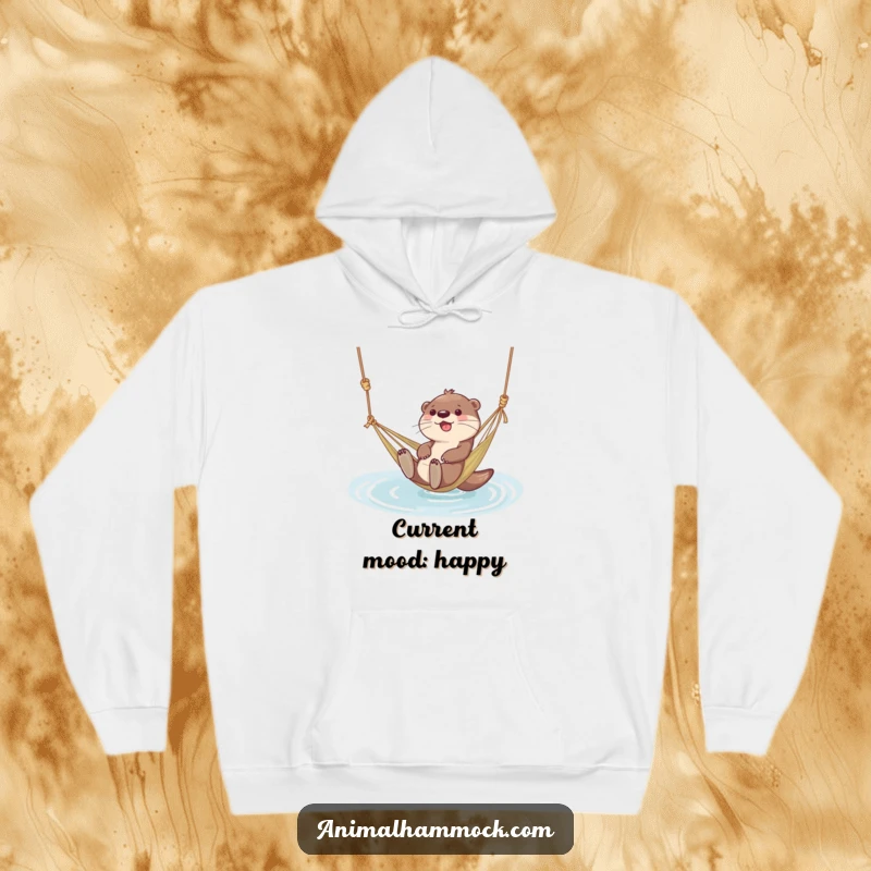 Funny hoodie with a giggling otter character floating in a hammock tied to water, perfect for casual, happy lounging.