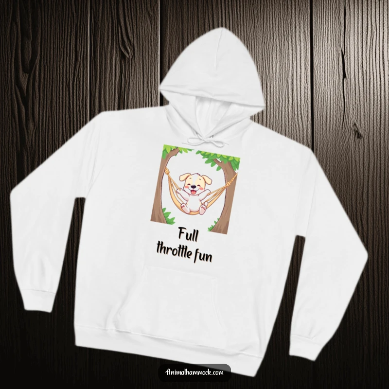 Funny hoodie depicting a playful puppy bouncing with excitement in a hammock, exuding fun and high energy.