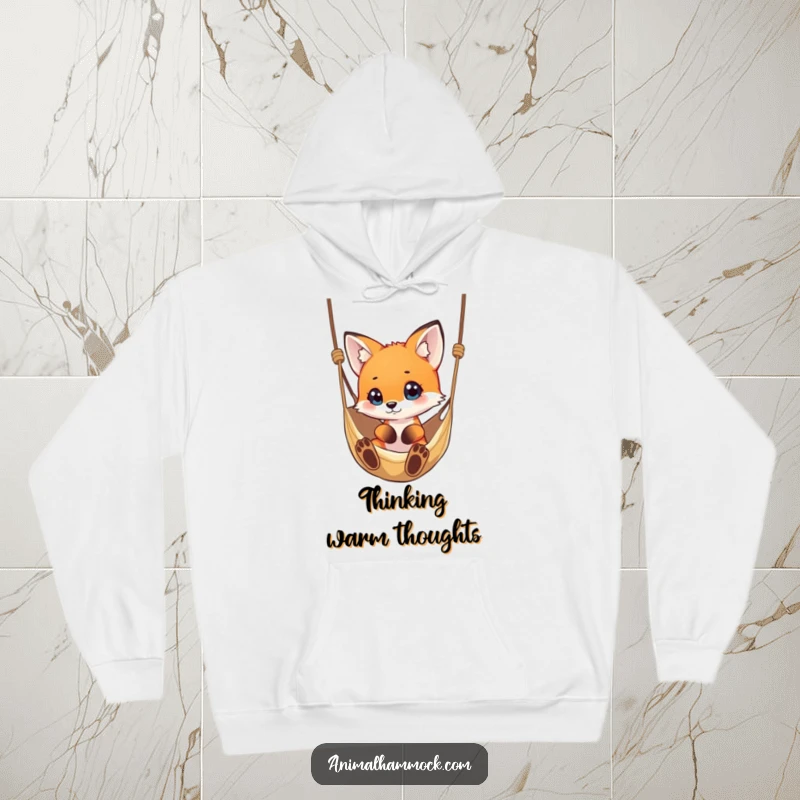Funny small fox with a curious gaze fixed on a hammock, perfect for a cozy and humorous hoodie.