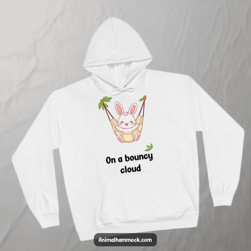 Funny Bunny Hoodie, a cheerful bunny character bouncing gently in a striped hammock, offering cozy comfort and smiles.