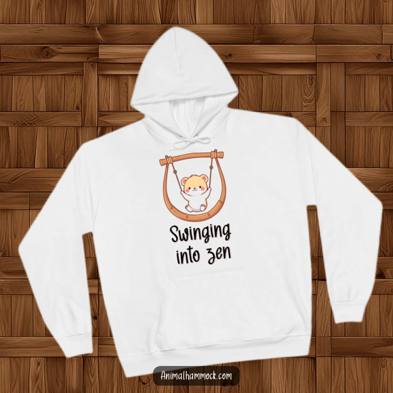 Funny hoodie featuring a small animal peacefully swinging in a hammock, offering warmth, comfort, and a touch of whimsical charm.