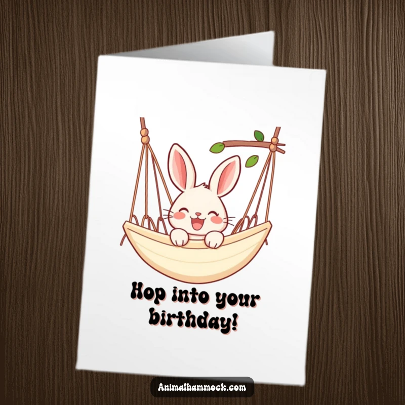 Funny Free Printable Birthday Card: Joyful rabbit peeking happily over the edge of a hammock.