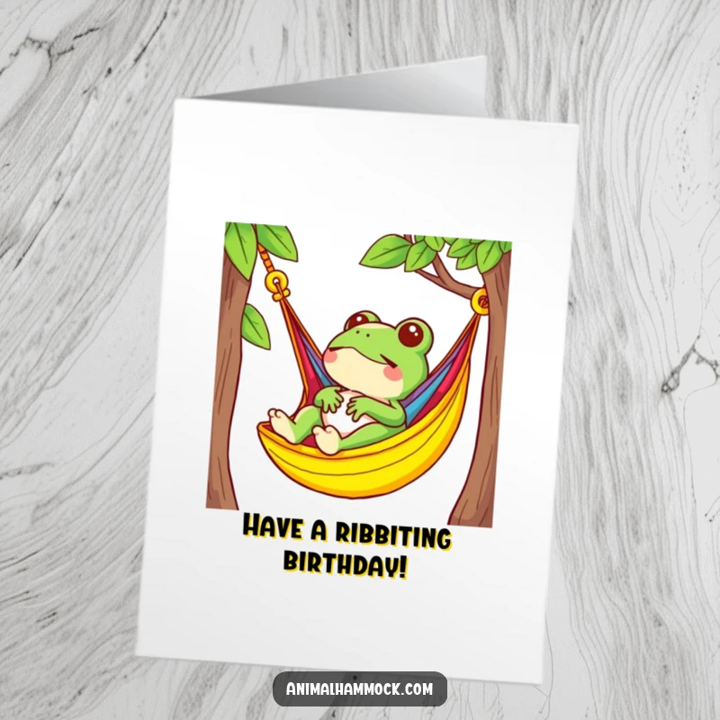 Funny Free Printable Birthday Card: Small frog serenely relaxing in a brightly colored hammock, humorous downloadable greeting.