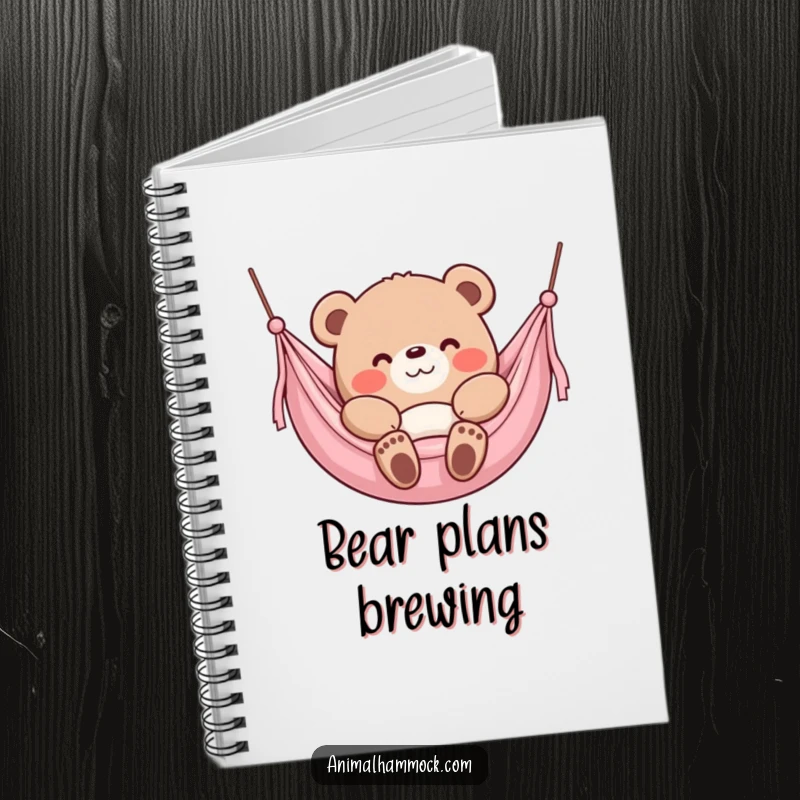 Funny Bear Notebook, a content bear character sinking into a plush hammock with a smile, ideal for journaling.