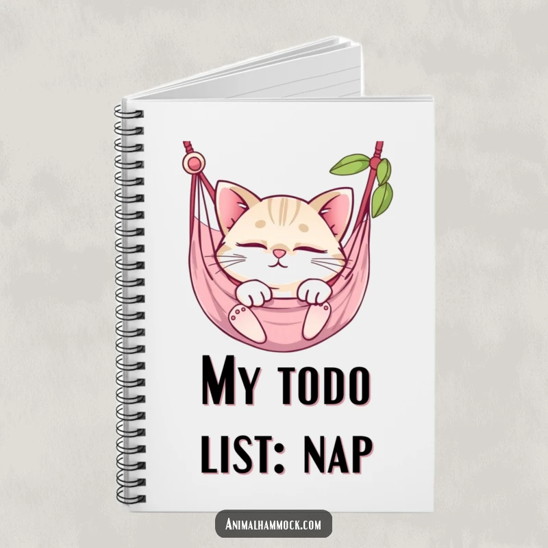 Funny round cat with big, beautiful eyes fast asleep in a hammock, featured on the cover of this notebook.