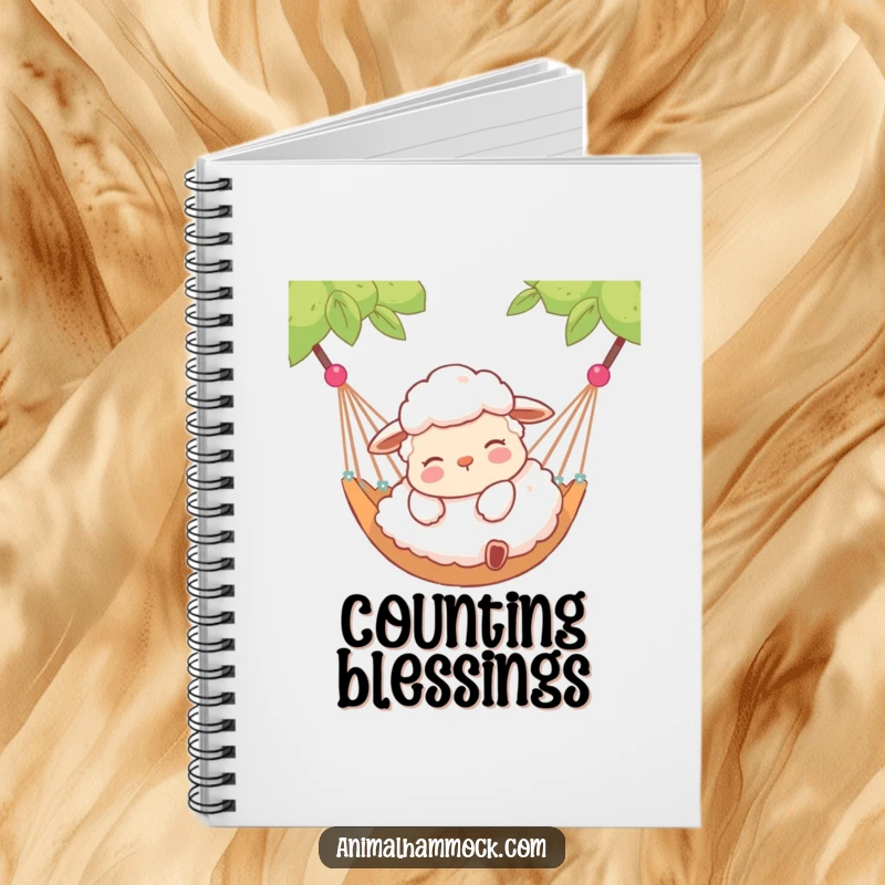 Funny notebook with a contented sheep lying peacefully in a hammock, perfect for jotting down calm thoughts and dreams.