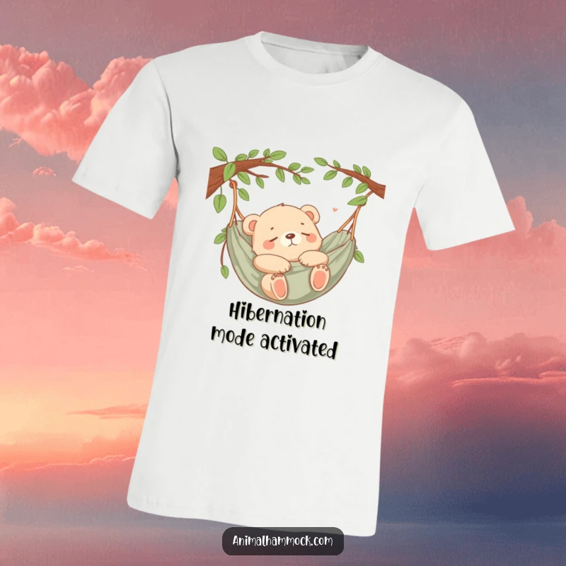 Funny Bear Cub Snooze T-Shirt depicting a peaceful bear cub fast asleep in a hammock, embodying ultimate relaxation.