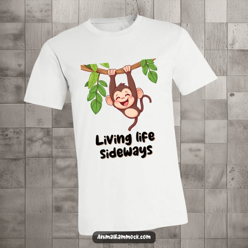 Funny monkey t-shirt featuring a giggling monkey hanging upside down in a hammock, conveying a humorous and carefree mood.