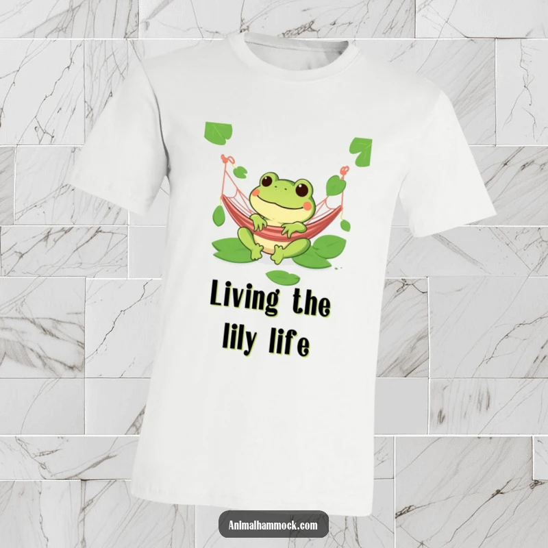 Funny green frog grinning in a hammock, surrounded by lily pads, on a comfortable t-shirt.