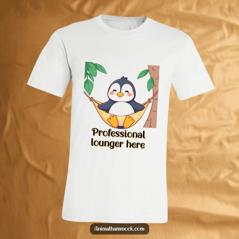 Funny t-shirt with a proud penguin character sitting upright and smiling while relaxing in a hammock, a symbol of pure bliss.