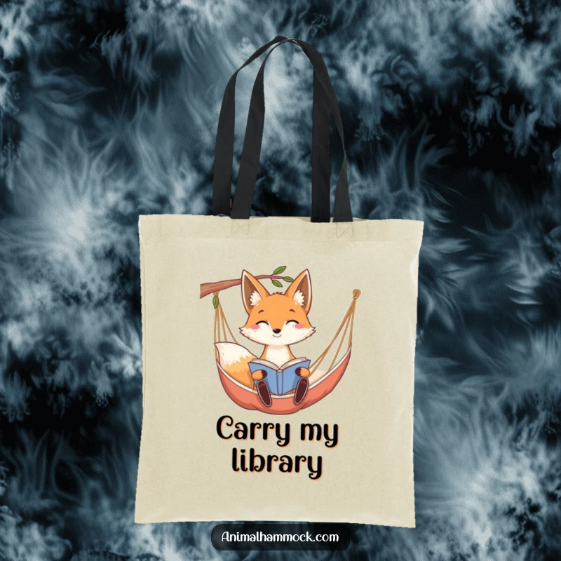 Funny smiling fox with long ears reading a book while relaxing in a hammock, perfect for this stylish tote bag.