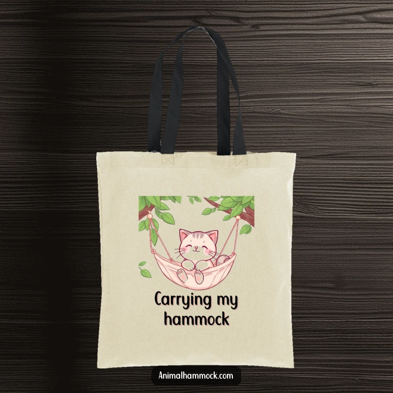 Funny Cat Tote Bag: Features a cute cat character happily relaxing in a swaying hammock, embodying peace.